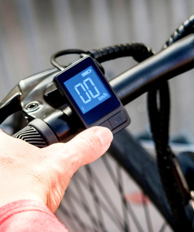 Man Holding Electric Bike Handlebar Man Holding Electric Bike Handlebar